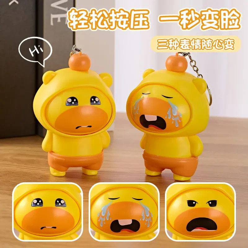 2025新款变脸公仔卡通3变水豚小挂件牛牛按压旋转钥匙扣整蛊玩具