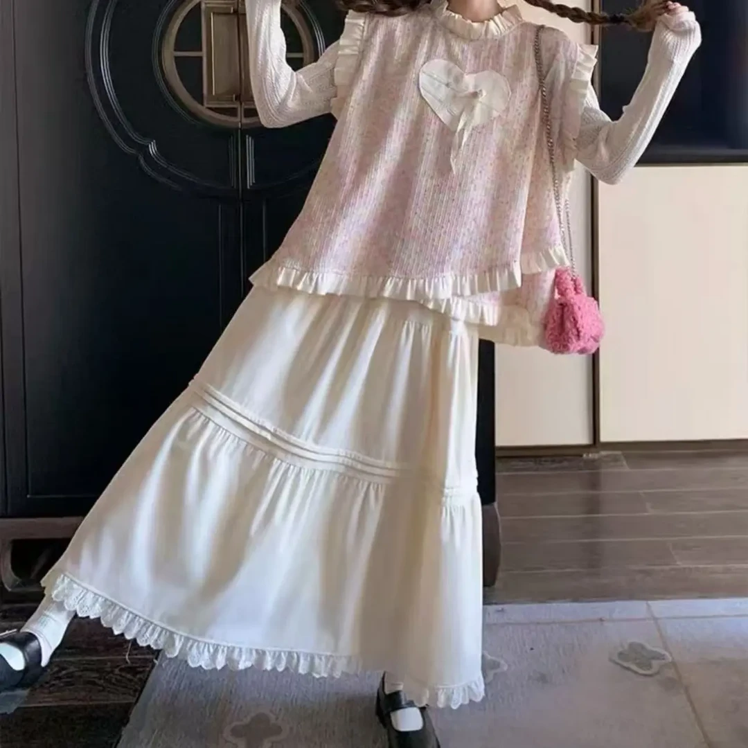 3364早秋甜美彩色针织木耳边马甲打底衫半身裙套装