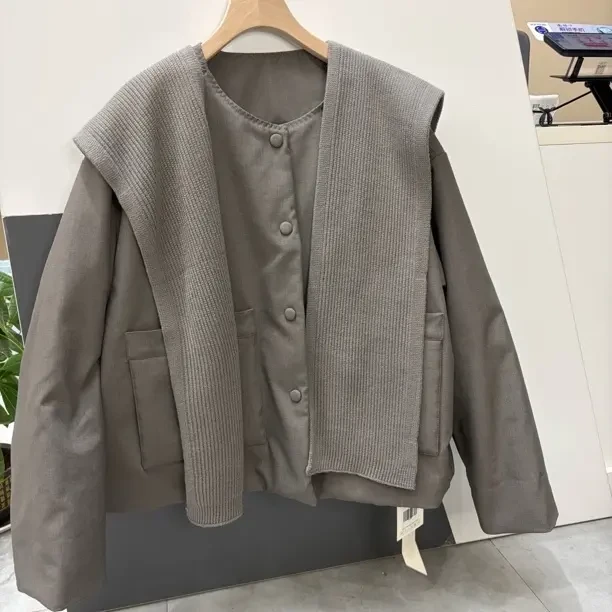 独特设计感羽绒外套与针织半裙叠穿套装