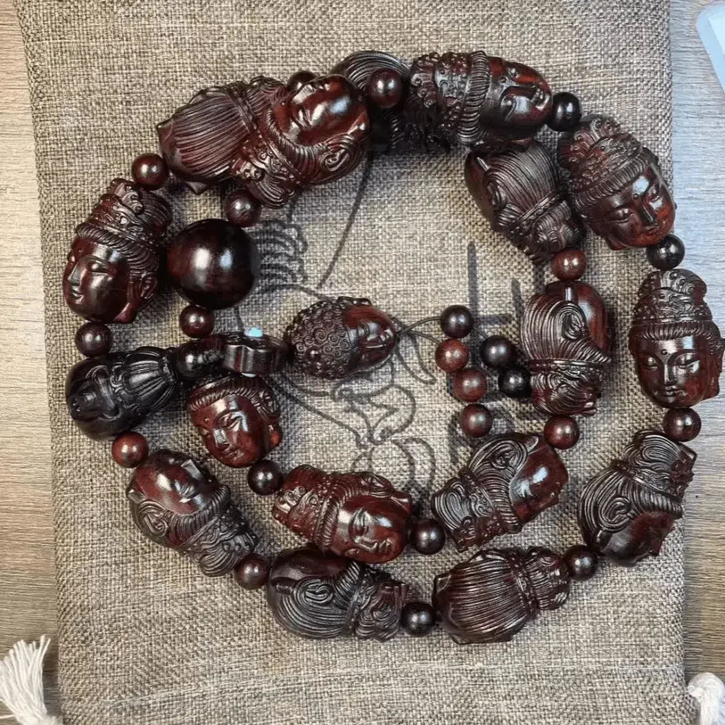 卢氏黑黄檀观音手持单颗尺寸3.0cm