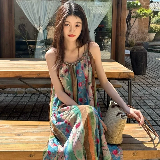 茶歇法式碎花吊带连衣裙子女夏季2025新款小个子海边度假沙滩长裙