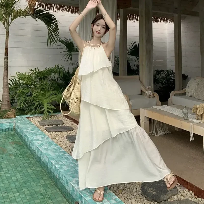 巨好看的夏装小众风独特连衣裙夏日感不规则裙子法式白色无袖挂脖