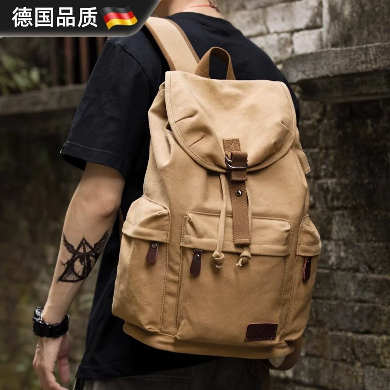 德国复古男士帆布双肩包大学生书包休闲潮流大容量旅行包旅游男