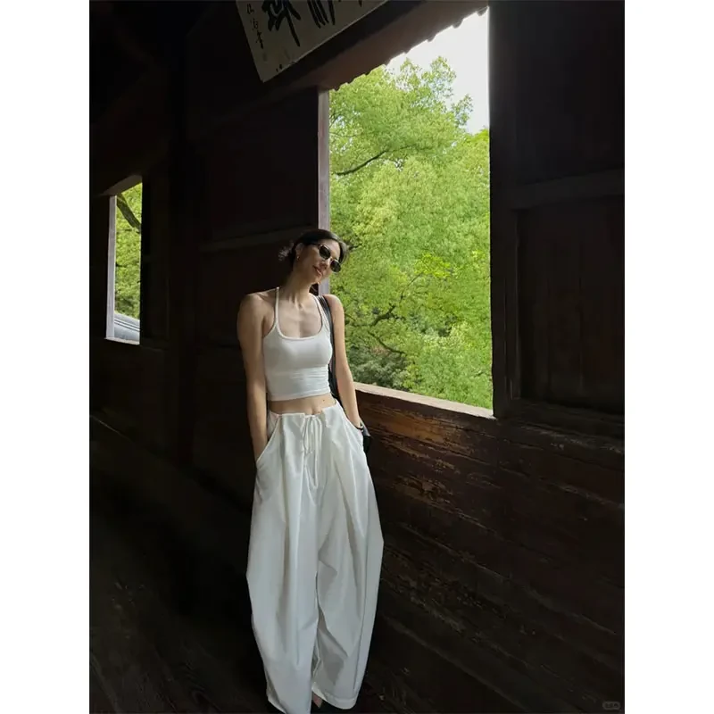 2025夏季洋气衣服女白色挂脖无袖上衣休闲两件套宽松阔腿长裤套装