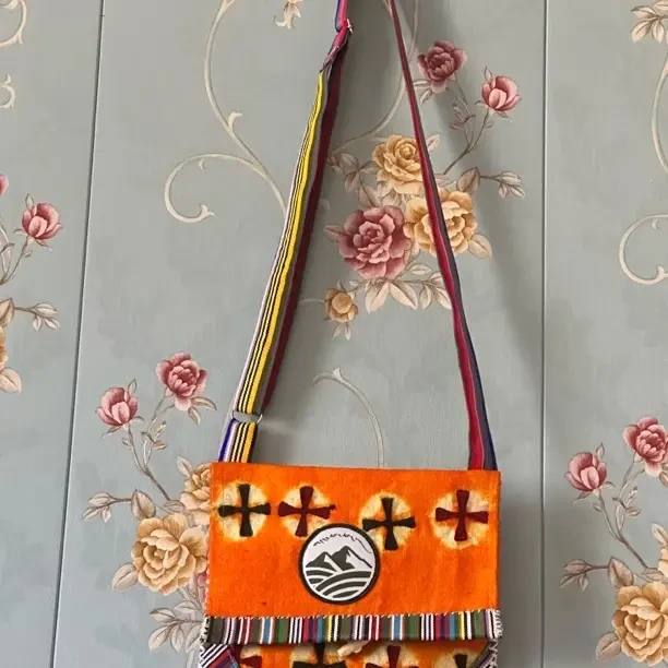 斜挎包民族风流苏拉链复古单肩手机包编织包古装传统桔色小包