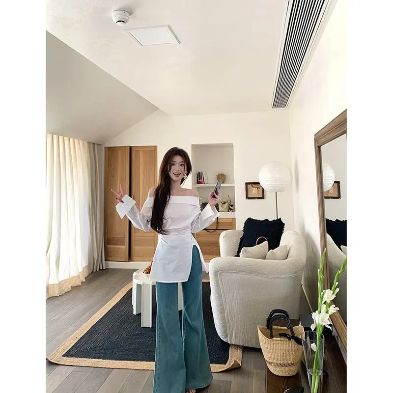 春装女款爆款2025新款韩系气质一字肩开叉长袖上衣高腰显瘦牛仔裤