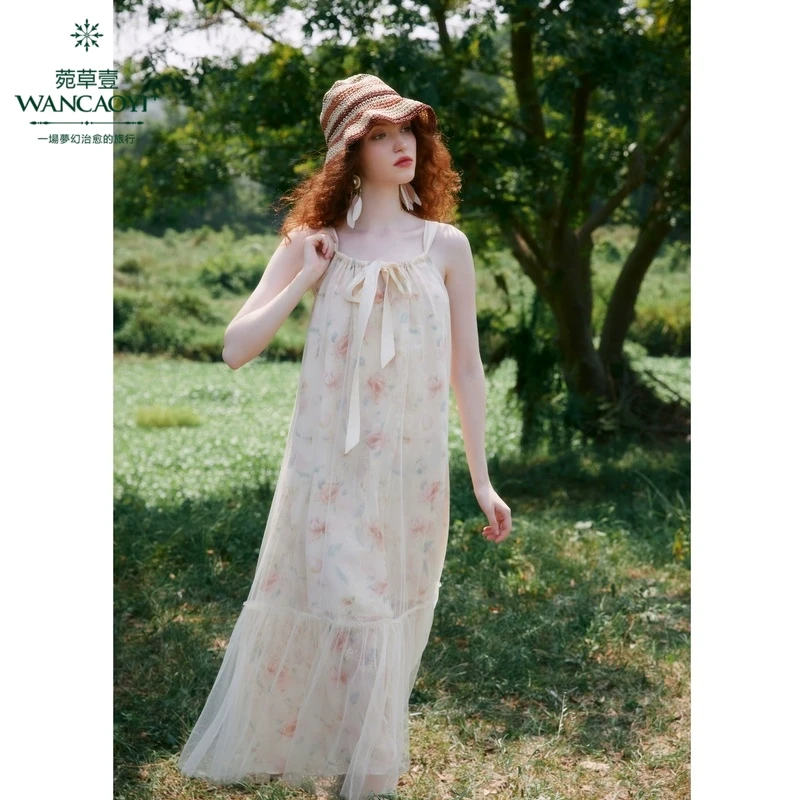 菀壹2025春季新款吊带连衣裙女宽松腰碎花a字中长裙子Q04511519