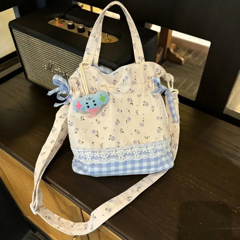 韩系小众抽绳碎花帆布包包2025新款甜美百搭手拎手提通勤单肩包TJ