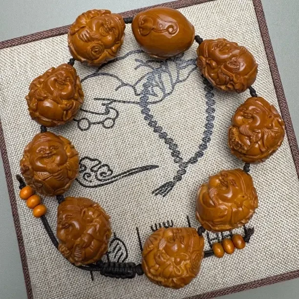 手工雕刻八大财神橄榄核雕手串文玩把件男女通用