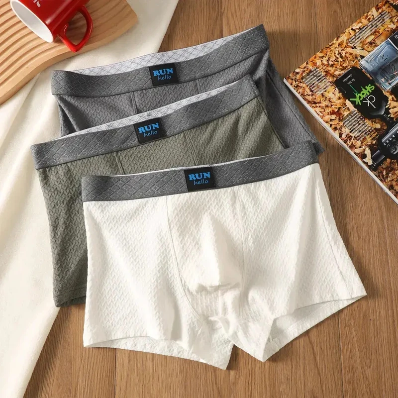 纯棉新款纯色简约男士内裤运动休闲透气平角裤爆款舒适四角短裤头