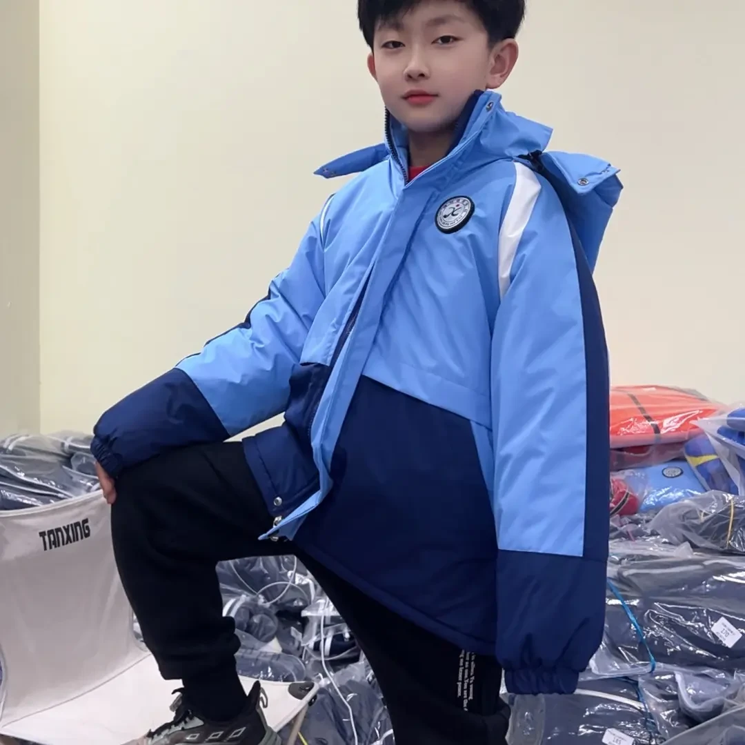蓝色加厚小学生冬季保暖防风冲锋衣棉衣校服
