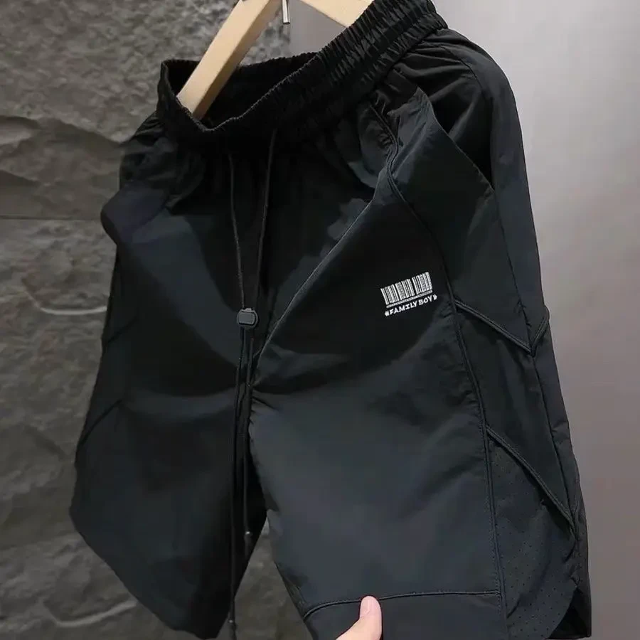 夏季新款潮牌速干休闲短裤男时尚宽松百搭激光打孔透气冰丝五分青