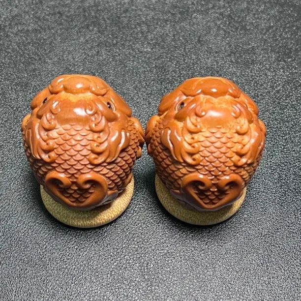 橄榄核雕刻貔貅文玩手把件