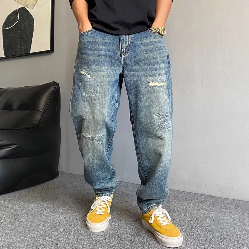春秋季潮流高街破洞牛仔裤男款爆款2025新款大码男装宽松锥形裤