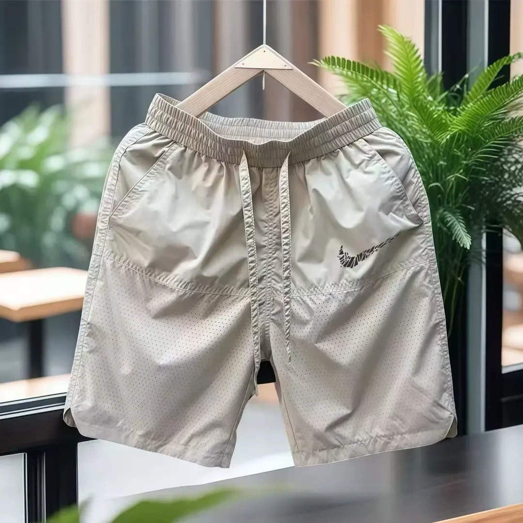 奥特莱斯官方2025夏季新品休闲短裤男松紧腰打孔透气薄款运动中裤