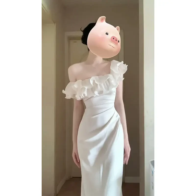 设计感连衣裙2025夏季新款法式气质露肩修身显瘦荷叶边中长款裙子