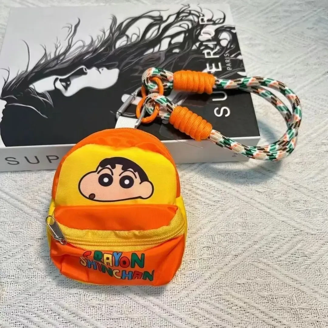 创意蓝牙耳机零钱包小新爆款手机书包挂件背包防丢挂绳个性收纳袋