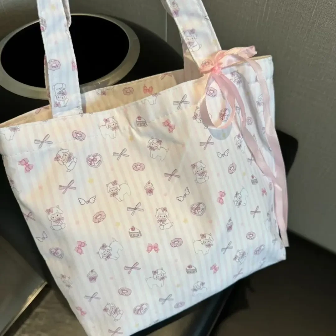 韩系大容量碎花帆布托特包2025新款小羊卡通通勤单肩包小众手提包