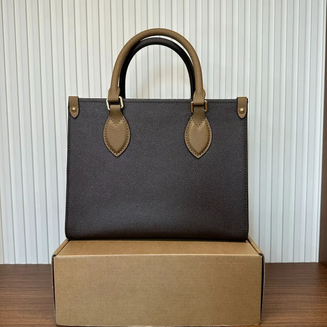 L003（丛林otg大号41*31*17）广版带级刚五金时尚女包