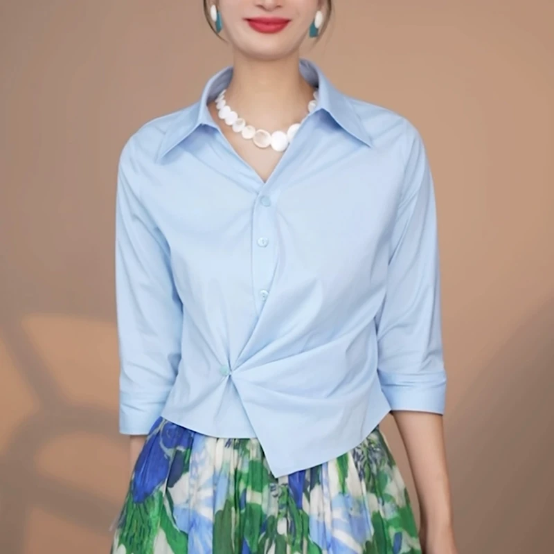 蓝色休闲收腰衬衫女士2025夏季新款洋气减龄显瘦设计感不规则上衣