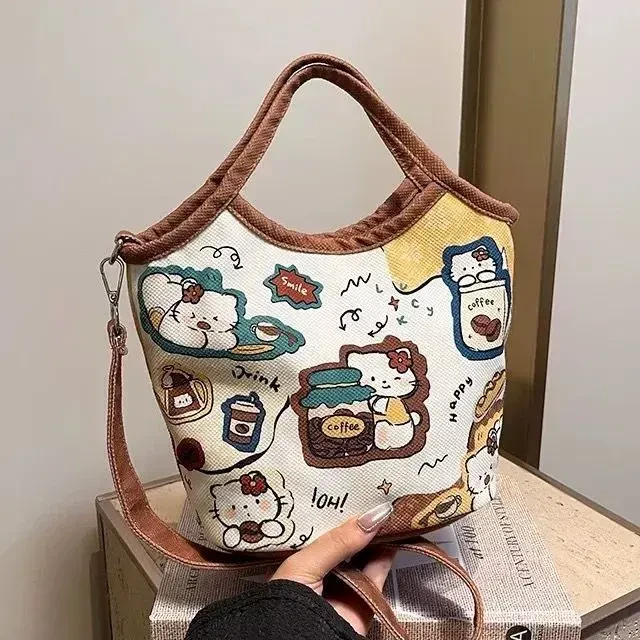 HelloKitty插画包包女可爱卡通小狗手拎水桶包休闲百搭单肩斜挎包