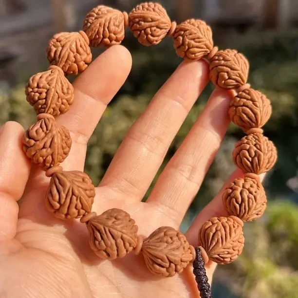 秦岭龙纹桃核原生态全品无修豹子头桃核手串疙瘩龙红魔爆肚手把件