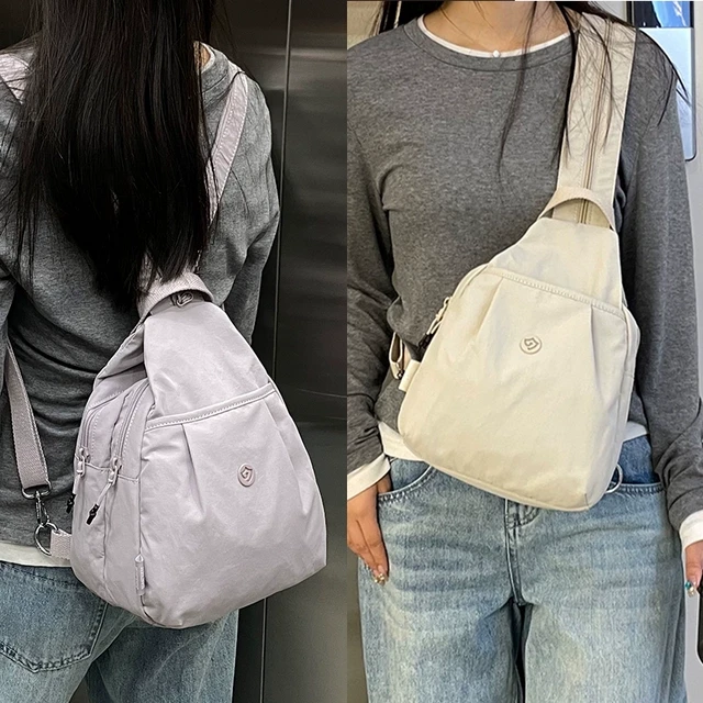 多功能双肩包女2025新款休闲多用小背包大容量轻便帆布旅行斜挎包