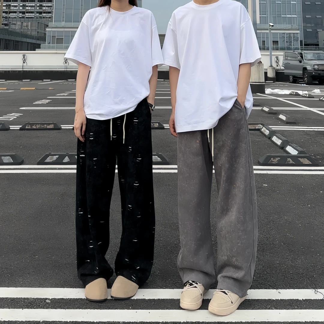 早秋撞色卫裤不规则破洞弯刀裤直筒长裤秋季卫裤男潮流ins休闲裤