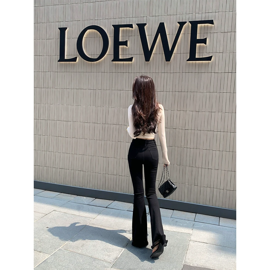 ACHI大也池◆超模比例~黑色高腰微喇叭水洗牛仔裤修身显瘦