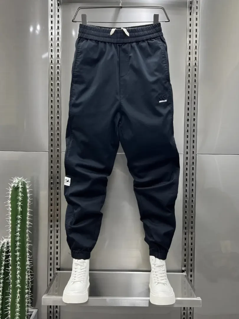 2025秋季薄款休闲裤拼接弹力束脚裤潮流哈伦裤韩版修身小脚裤男裤