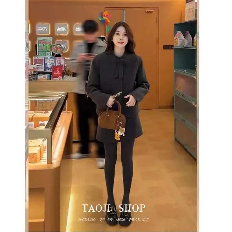 壹壹伦敦冬夜2025冬季新款蝴蝶结羽绒外套时尚百搭半身裙两件套装