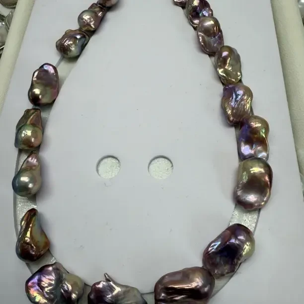 幻彩紫色淡水巴洛克珍珠皮滑干净无洞眼多样设计