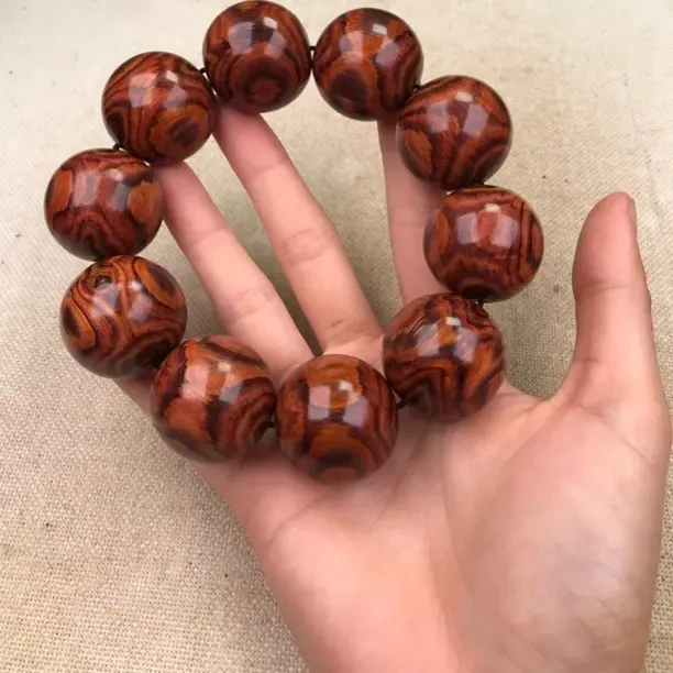 手串带鬼脸对眼油梨老料男女款文玩念珠