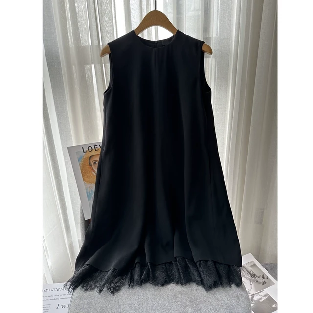 赫本风小黑裙2025夏季新款宽松显瘦高级感蕾丝拼接下摆气质A字裙