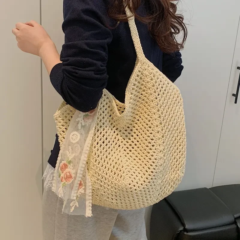 慵懒风腋下包包女夏大容量棉线镂空编织包海边度假通勤单肩托特包