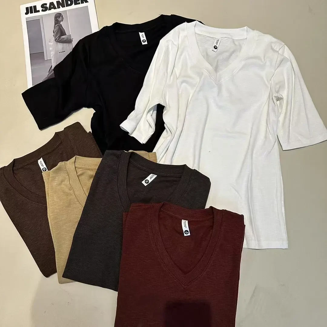 《姚家优麦汇》Y5232早春款V领设计感时尚百搭短袖显瘦上衣款女