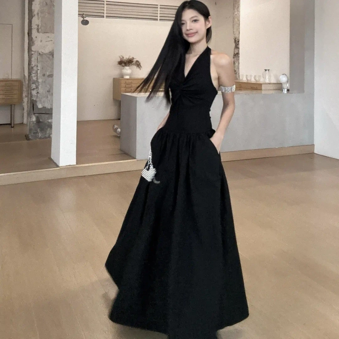 .Tong Tong 2025夏季新款挂脖辣妹拼接设计款感显瘦收腰大摆长裙