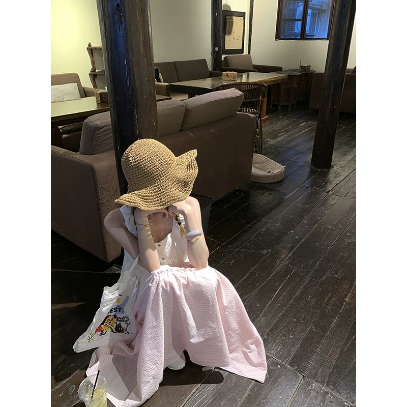 圆脸柒柒 温柔气质甜美条纹半身裙女2024新款a字高级感木耳边长裙