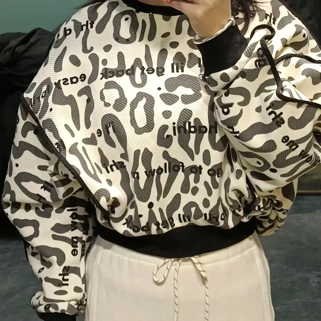 印花包边长袖休闲情侣小众宽松圆领卫衣不规则下摆辣妹时髦