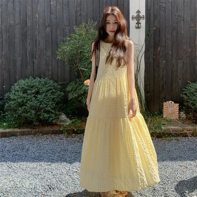 华夫格黄色无袖连衣裙女夏季2025超火独特绝美法式茶歇减龄长裙子