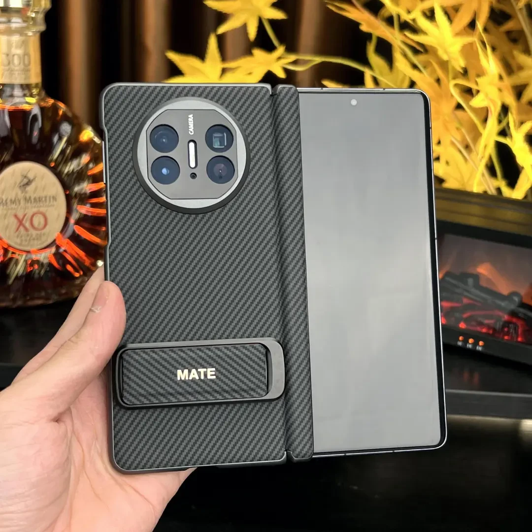 适用华为MateX6碳纤维纹皮质旋转腕带支架手机壳matex5/3镜头全包