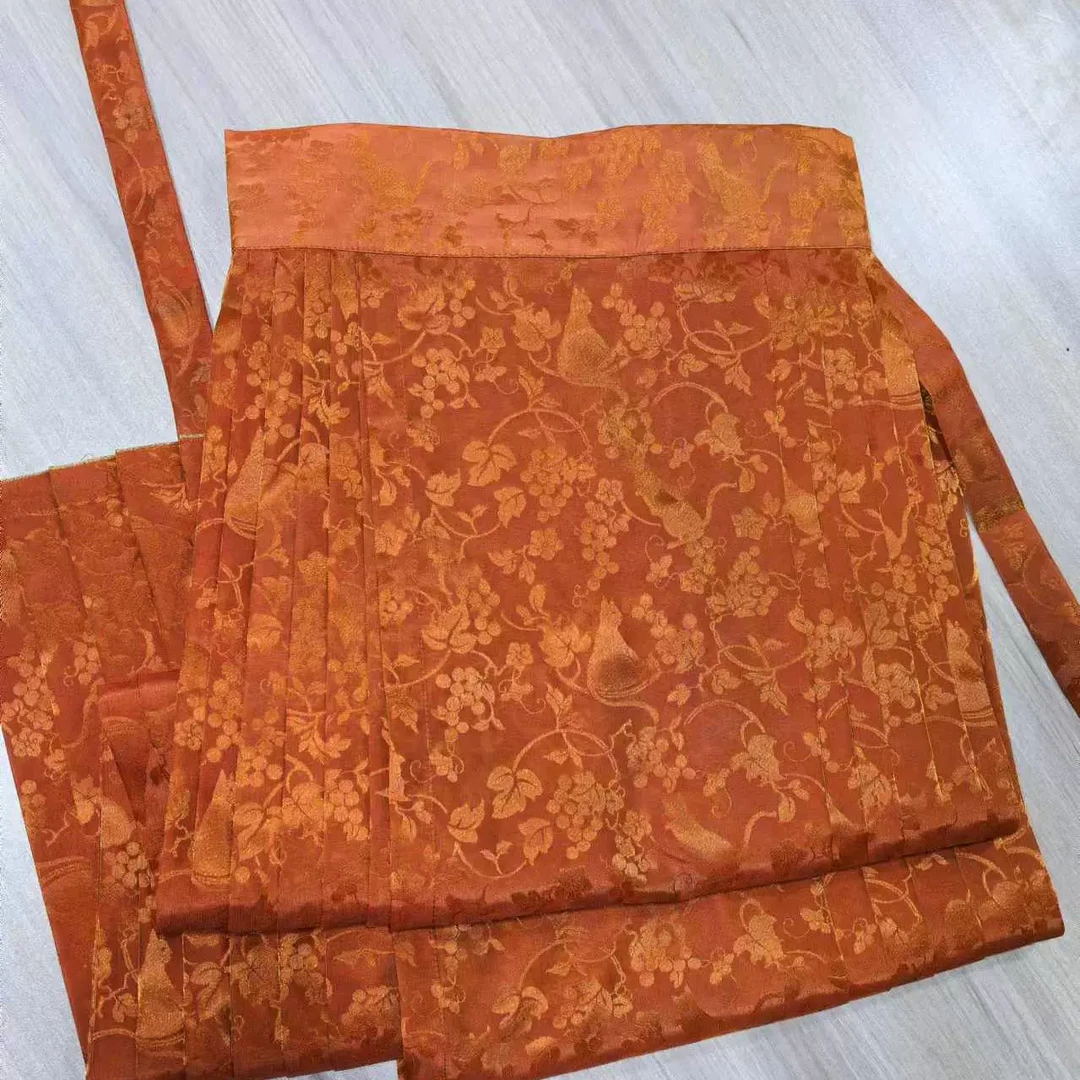 南山韵味 2025 原创设计珊瑚色灵光纱纯色圈金马面裙女波光粼粼春