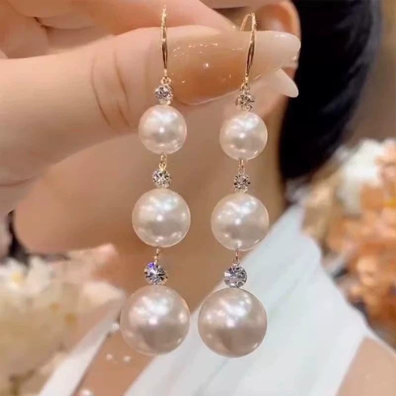 铜合金亚克力耳饰 旋士 长款显瘦珍珠耳坠小众设计感耳环2025新款