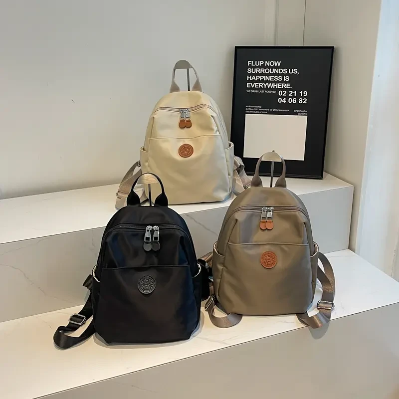 春季新款轻便透气防水背包时尚双肩包包大容量防水行李袋旅行包