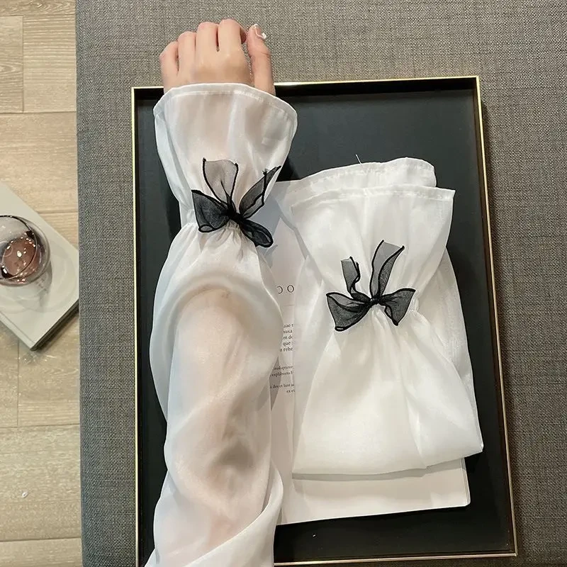 冰丝袖套女2025新款蝴蝶结夏季手袖防紫外线手套宽仙女风冰袖