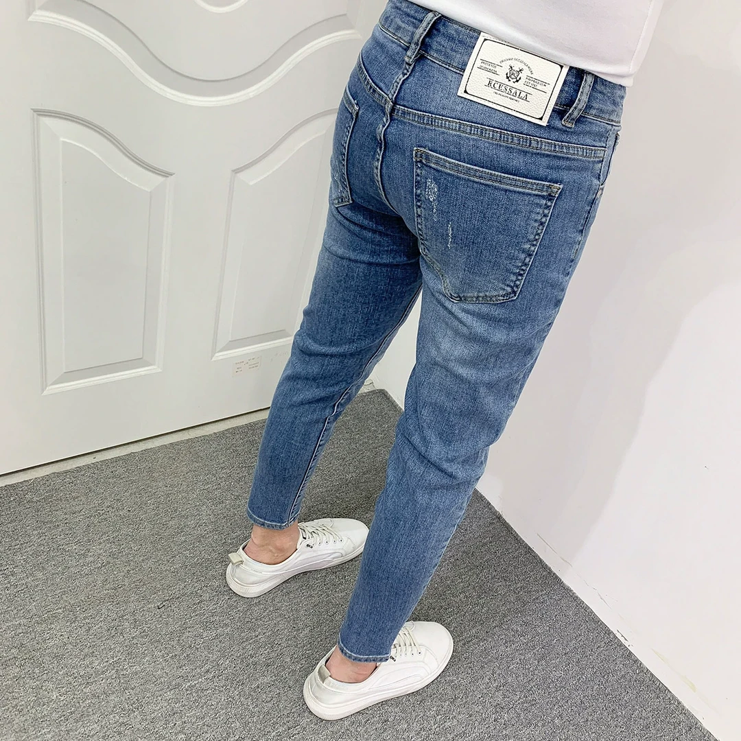 水洗蓝色九分牛仔裤男2025夏季新款青年韩版百搭做旧修身小脚裤