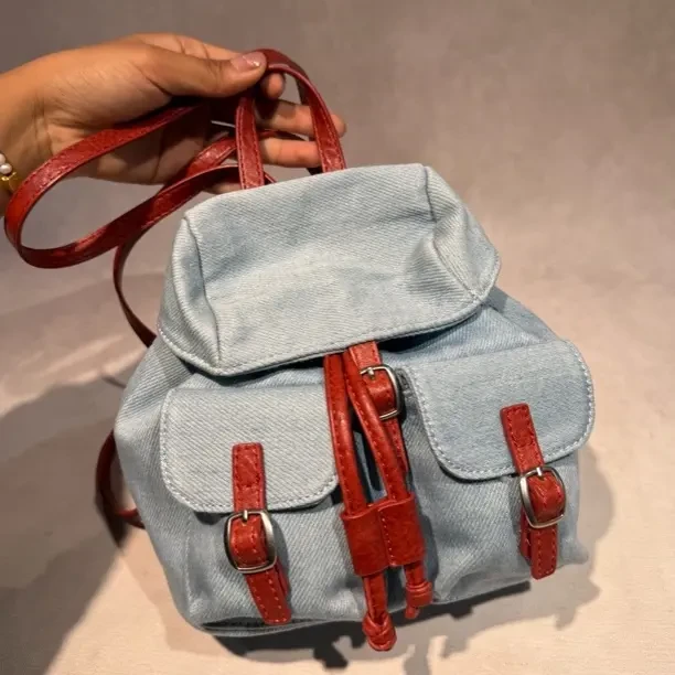 可爱风包盖耐磨车缝线磁扣双肩包学生潮流双肩背拼色