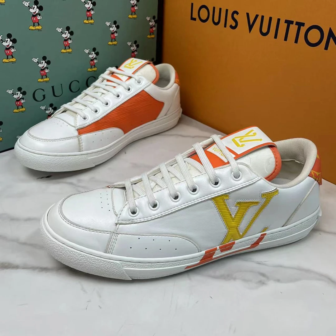 95新 LouisVuitton/路易威登 白橙拼接查理错位LOGO时尚板鞋/41码