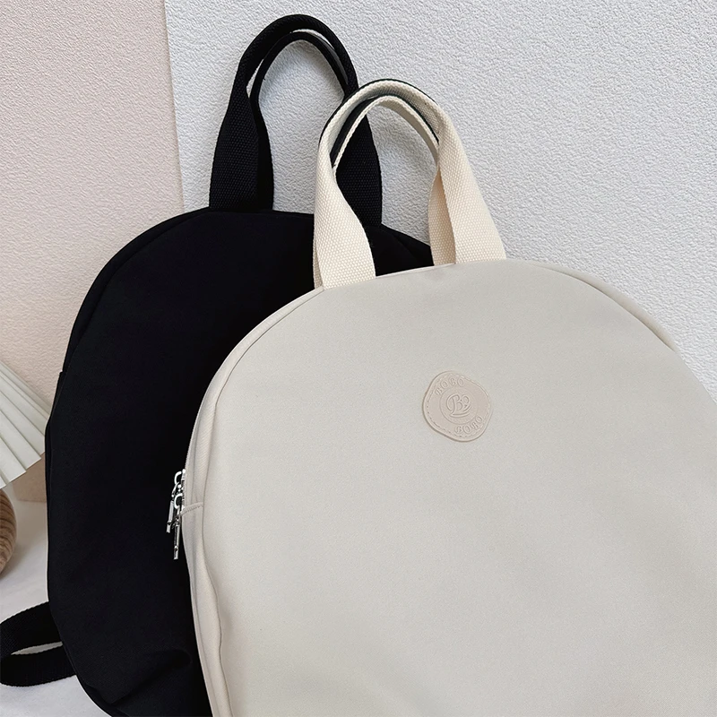 博卜2025年新款时尚百搭书包高级感休闲贝壳包简约双肩包旅行包女