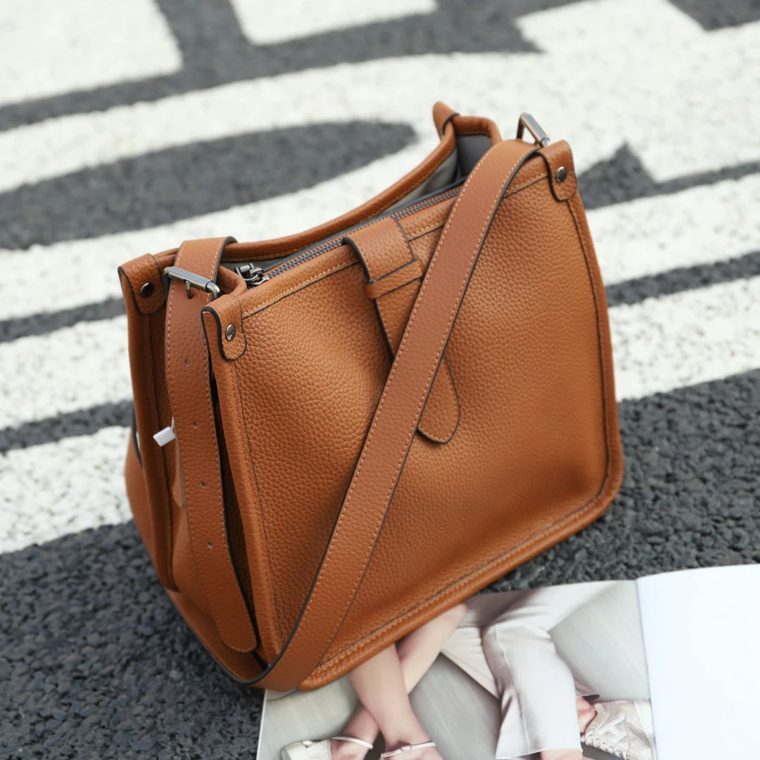 A06真皮大容量包包2025新时尚大包头层牛皮单肩斜挎水桶包1115